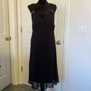 Patra black cocktail dress with delicate rhinestones detailing.